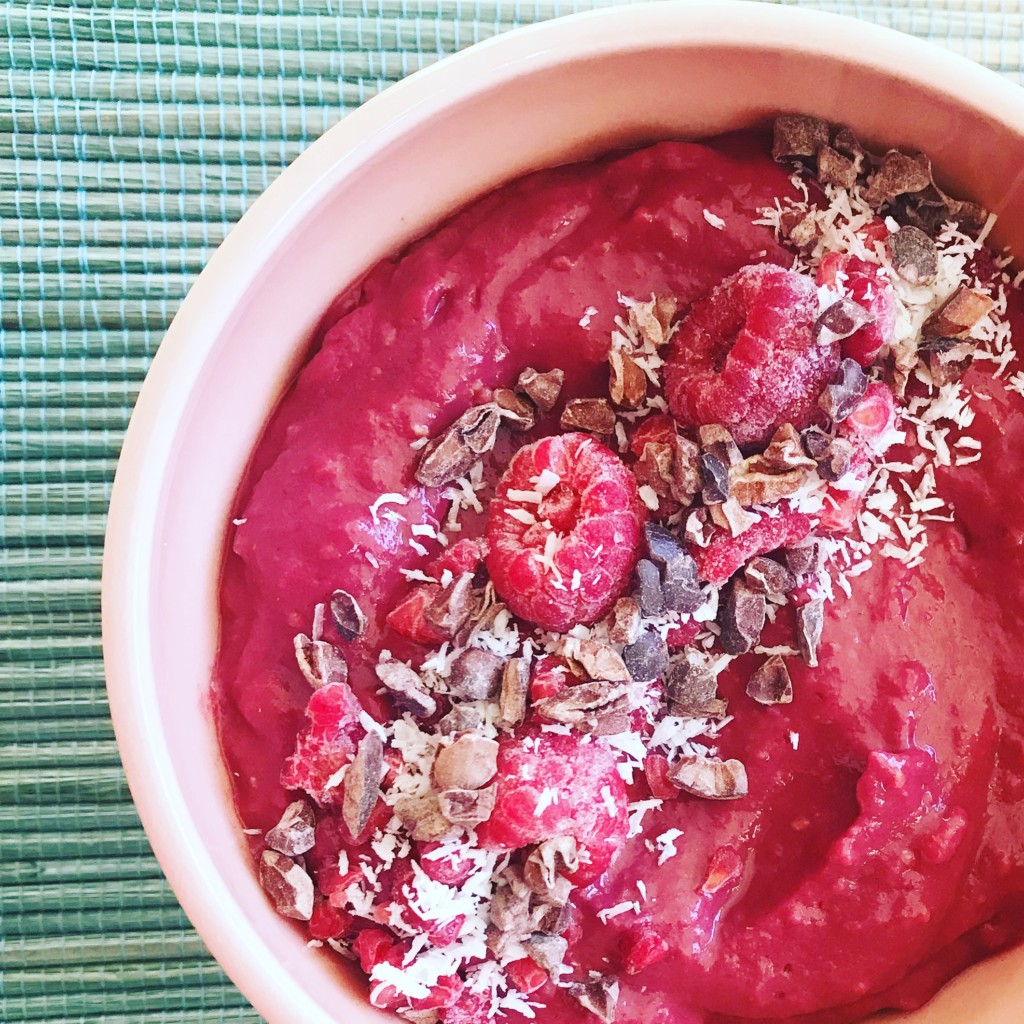 Vibrant Woman Beet and Raspberry Smoothie Bowl